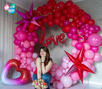 Arche ronde rose rouge pour la St Valentin, en Savoie à La Motte Servolex